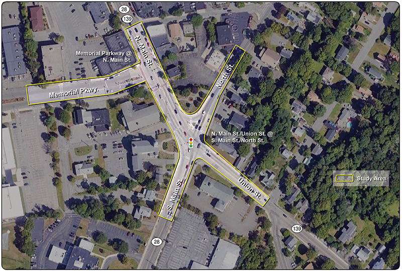 Figure 1: Study Area
An aerial image of the study area shows the highlighted study intersections in the center of Randolph. The area contains the intersection of Memorial Parkway at N. Main St. and the Crawford Square intersection.
Figure 1: Study Area
An aerial image of the study area shows the highlighted study intersections in the center of Randolph. The area contains the intersection of Memorial Parkway at N. Main St. and the Crawford Square intersection.